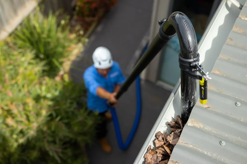 High level gutter vacuum cleaning